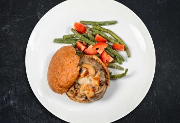 Grilled Mushroom Swiss Wild Boar Burger on Sprouted Grain